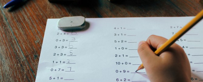 student doing first grade mathematics homework